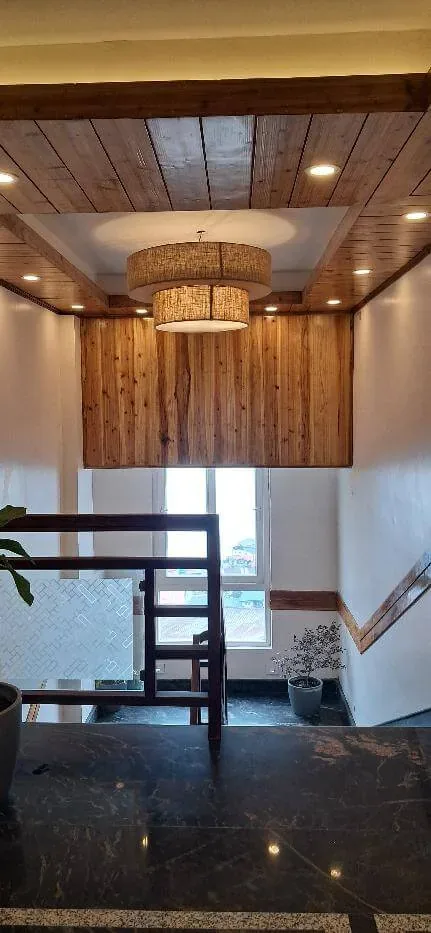 Canopy Boutique - Elegant Polished Staircase & Elevator Access