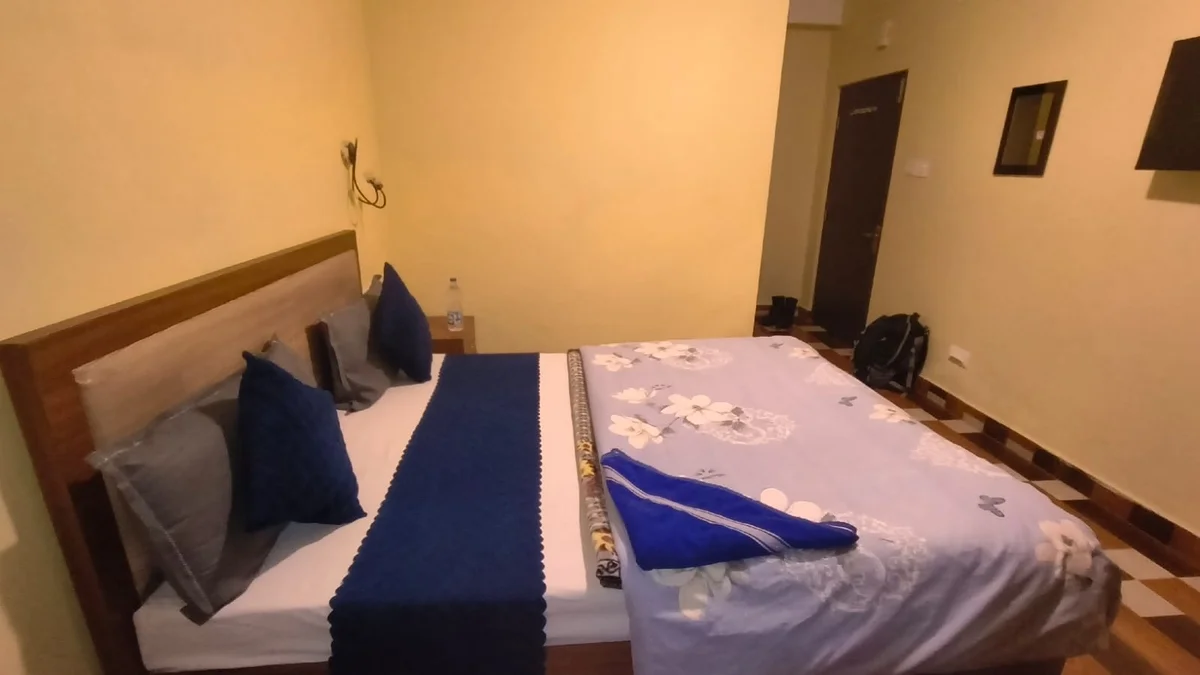 Hotel Manjushree Lava - Wood-Paneled Bedroom