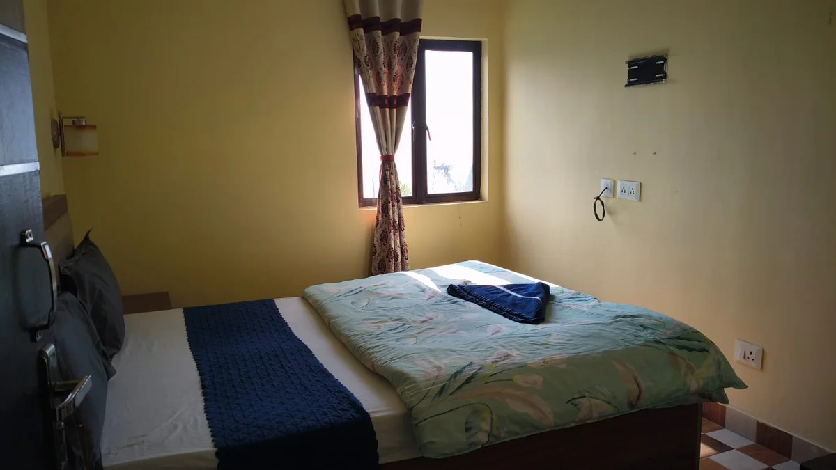 Hotel Manjushree Lava - Comfortable Bedroom Layout