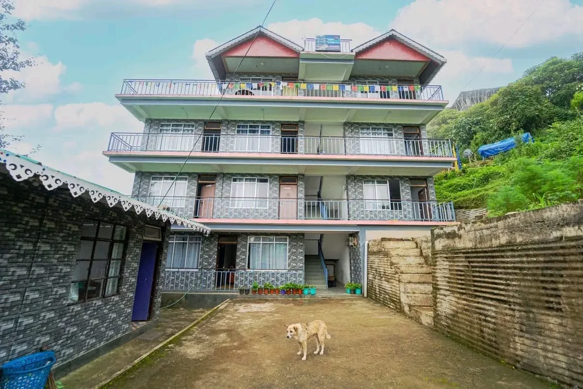 Red Roof Homestay Resort - Main Building & Courtyard