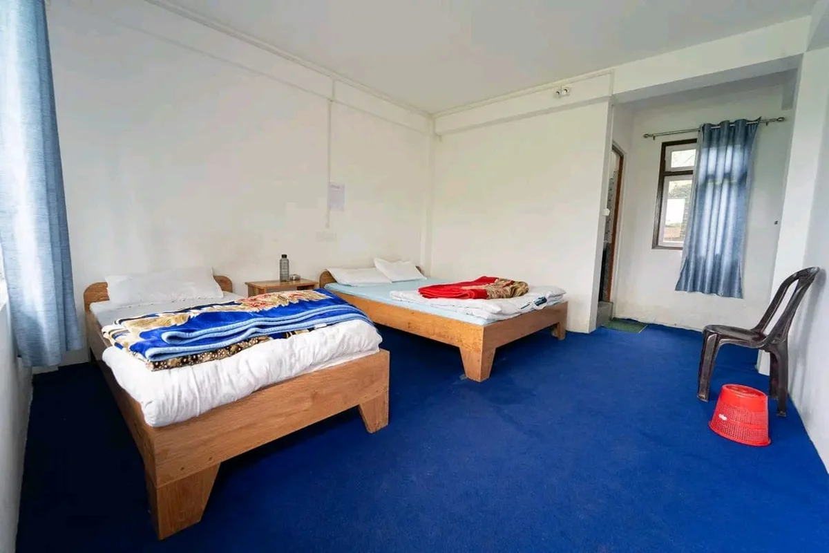 Red Roof Homestay Resort - Wide View Bedroom with Attached Washroom