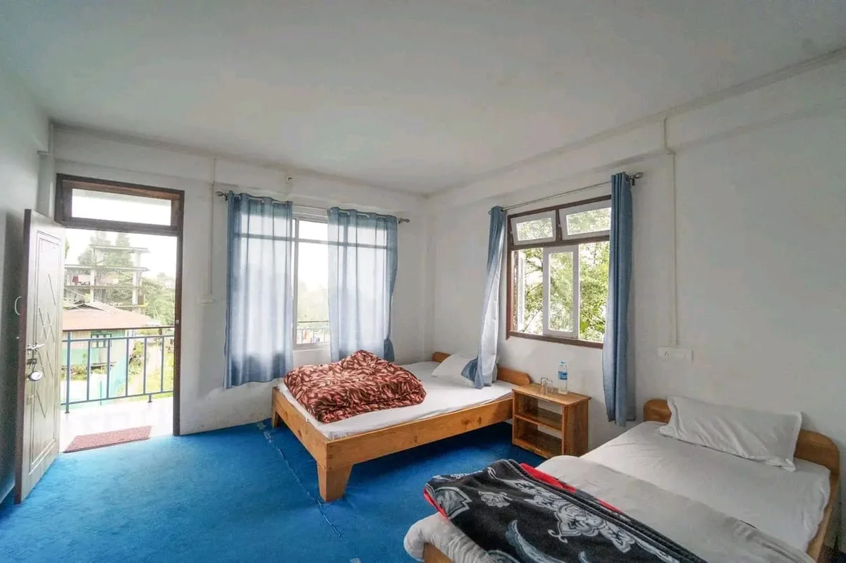 Red Roof Homestay Resort - Spacious Bedroom Accommodation